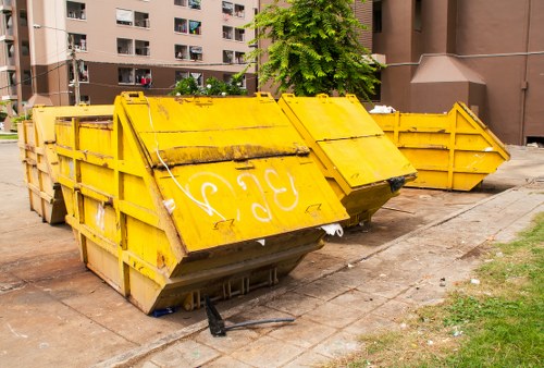 People evaluating old furniture for disposal in Kensington